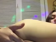 Teen plays with her pussy